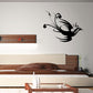 Black flying peacock wall decal with detailed tail and feather accents