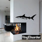 Black shark wall decal with stylized fins and tail