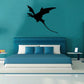 Flying dragon hunting decal, dark silhouette with curved tail and wings