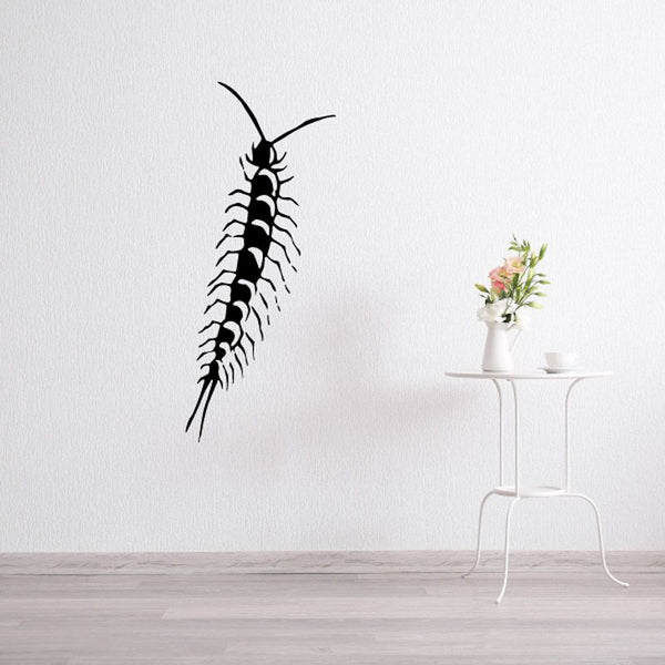 Millipede wall decal with black segmented body and antennae