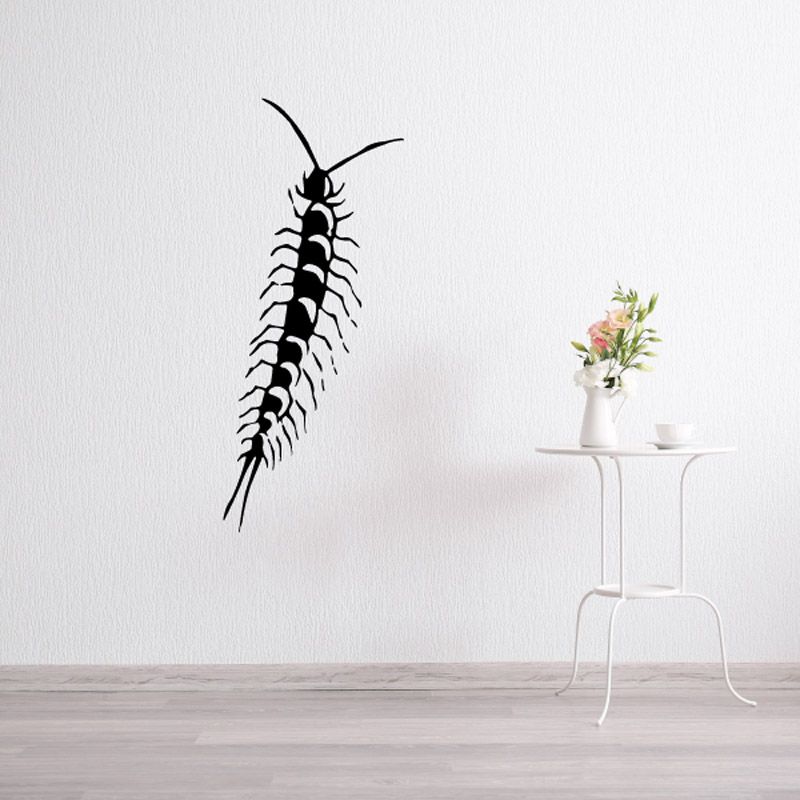 Millipede wall decal with black segmented body and antennae