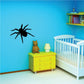 Black tarantula spider wall decal silhouette with eight legs.
