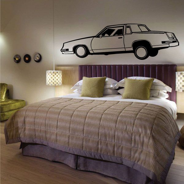Car wall decal, black and white outline illustration above bed