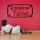 Black I Believe in Fairies wall decal with curly frame and stars
