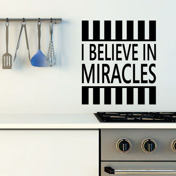 Black quote decal with striped bars and text "I BELIEVE IN MIRACLES".