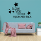 Black wall decal with text 'I LOVE YOU TO THE MOON AND BACK' and star shapes