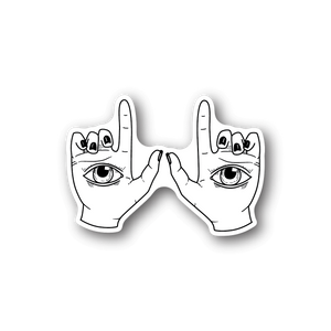 Vinyl sticker with two outlined hands framing an eye design