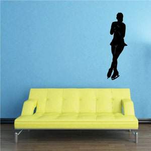 Ice skating wall decal, black silhouette of an ice skater holding a stick