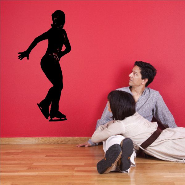 Ice skating wall decal: black skater silhouette with blades