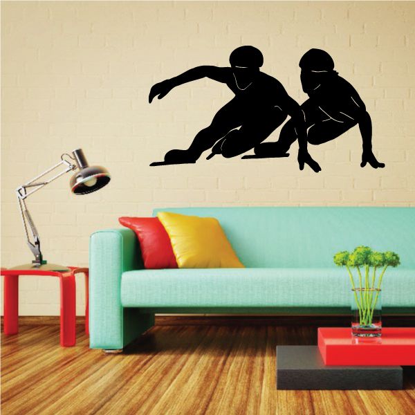 Ice skating vinyl wall decal with two black skater silhouettes