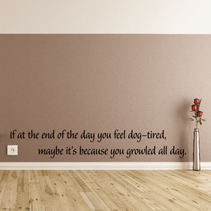 Wall quote mural decal with dog-themed text and small red flower vase on wall