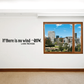 Wall decal with black Latin proverb text and arrow design on a white wall