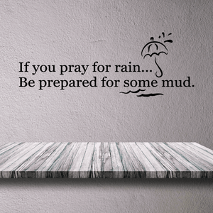 Wall decal with quote "If you pray for rain... Be prepared for some mud." with rain icon
