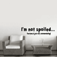 Wall decal with "I'm not spoiled..." and "Everyone is just very accommodating!" text