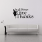 Black wall decal: “In all things Give Thanks” with leaf sprig