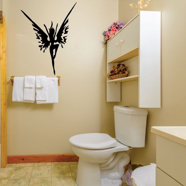 Black ink-blot fairy silhouette wall decal with wings and wand-like tip