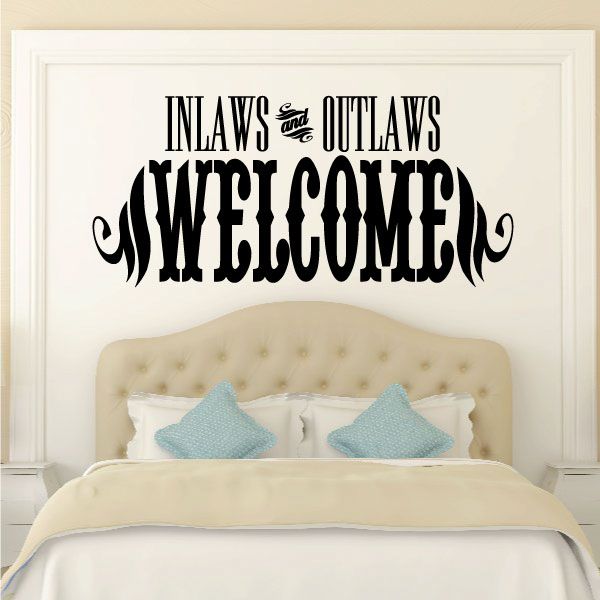 Vinyl wall decal with decorative script quote: “Inlaws and Outlaws welcome”