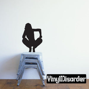 Woman silhouette decal, black standing figure holding an object