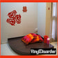 Red interlocking bird decal with ornate swirl pattern