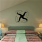 Interlocking four snake heads decal, black design on light surface