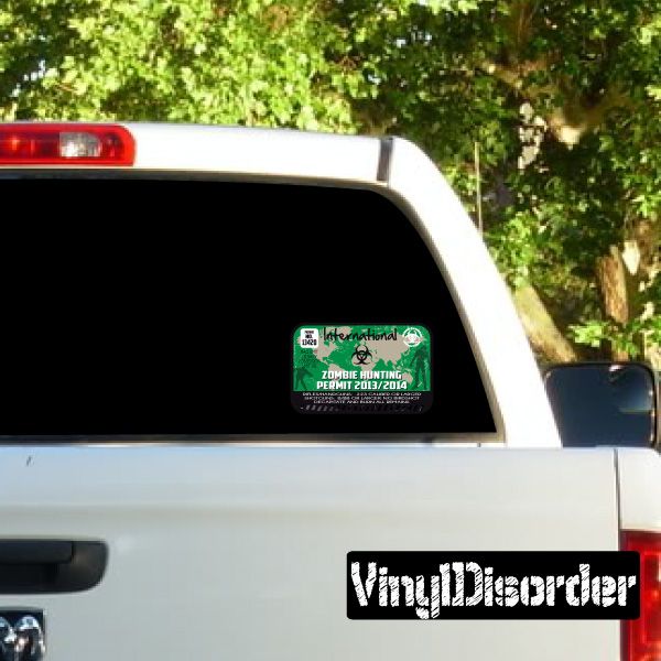 International Zombie Hunting Permit sticker on rear window, green and white text