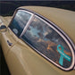 Awareness ribbon vinyl sticker with teal ribbon on a car window