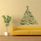 Christmas tree printed wall decal with green swirling branches and red star ornaments