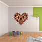 Ornate heart sticker with red and gold filigree design