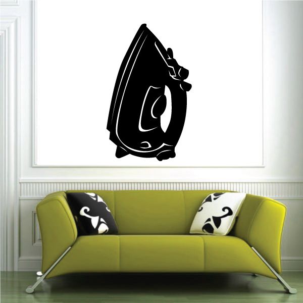 Black iron-on decal with stylized cartoon face in flame-shaped design