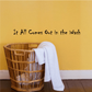 Wall decal text reading “It All Comes Out in the Wash”