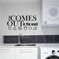 Wall decal: 'It comes out in the wash' with small laundry icons