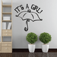 Umbrella wall decal reading “It’s a Girl!” with swirl design