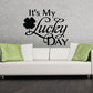 Black cursive clover wall decal reading 'It's My Lucky Day'