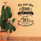 Wall decal with black quote text: “It’s not the home… the life lived here”