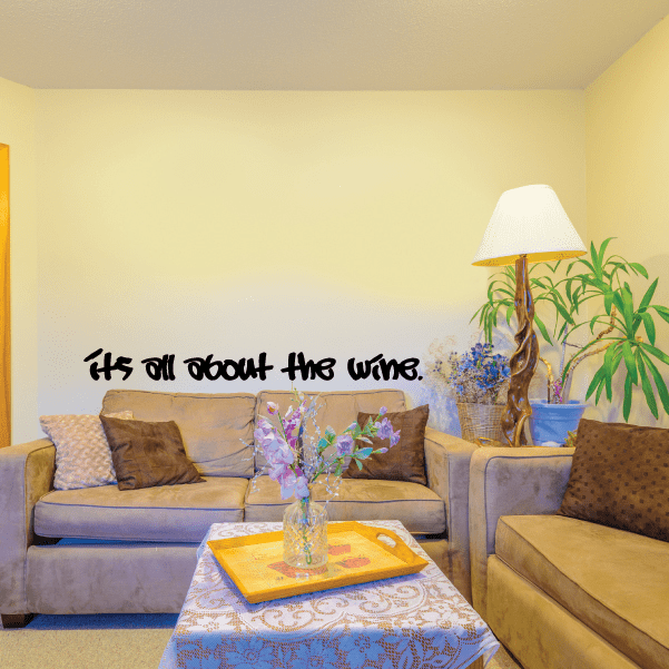 Wall decal with black script text: Its all about the wine