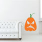 Orange jack-o-lantern angry frown decal with green stem