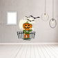 Die-cut decal: jack-o-lantern monster with green body, pumpkin head, bats and fence