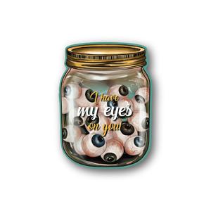 Jar of Eyes vinyl sticker with clear jar and lid, filled with cartoon eyes.
