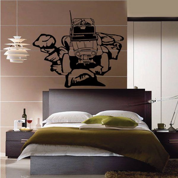 Off-road 4x4 jeep vinyl wall decal, black cartoon-style truck with rocky accents.