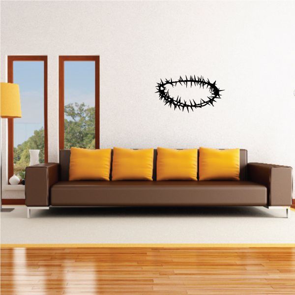 Crown of thorns wall decal with black thorny oval design