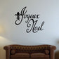 Joyeux Noel script wall decal with fleur-de-lis