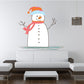 Snowman greeting wall decal: smiling white snowman with red scarf and orange hat