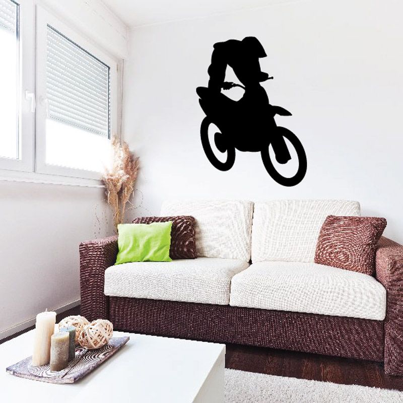 Dirt bike jumper decal with black silhouette of a rider mid-jump on a bike