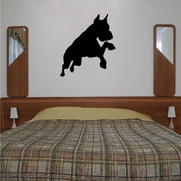 Black jumping boxer dog vinyl decal silhouette on light wall
