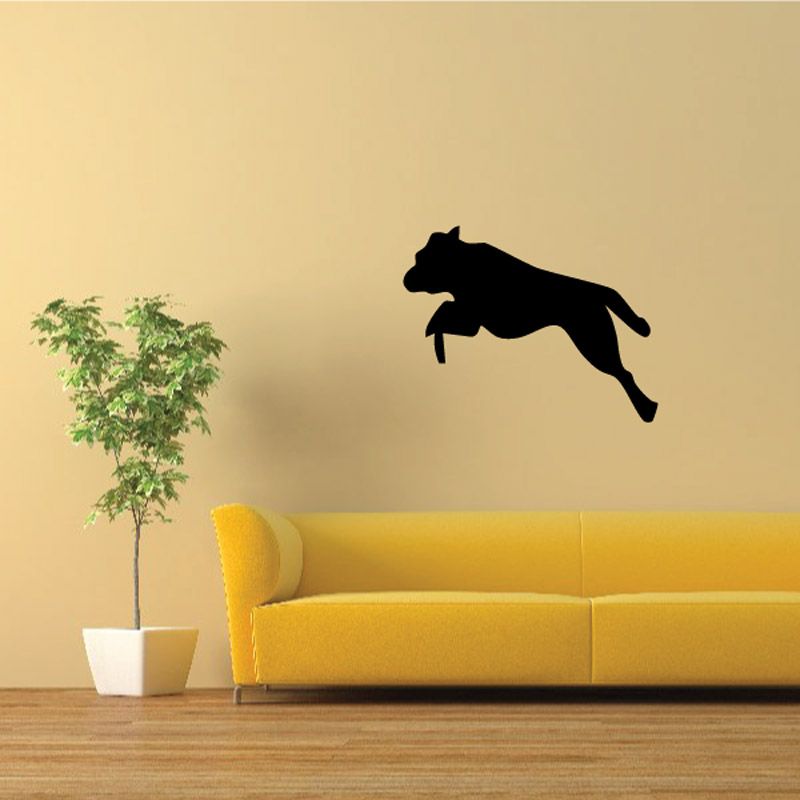 Jumping dog decal with black silhouette jumping forward