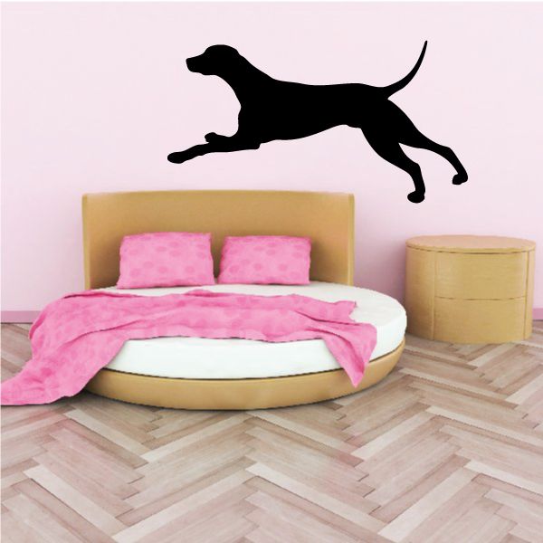 Jumping dog decal with black jumping dog silhouette
