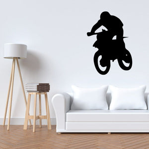 Black dirt bike rider jumping wall decal with bold silhouette