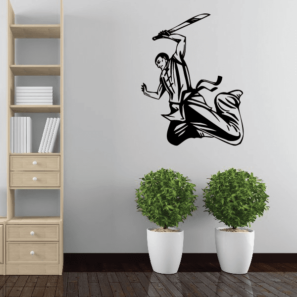 Karate wall decal vinyl sticker of a black kicking martial artist silhouette