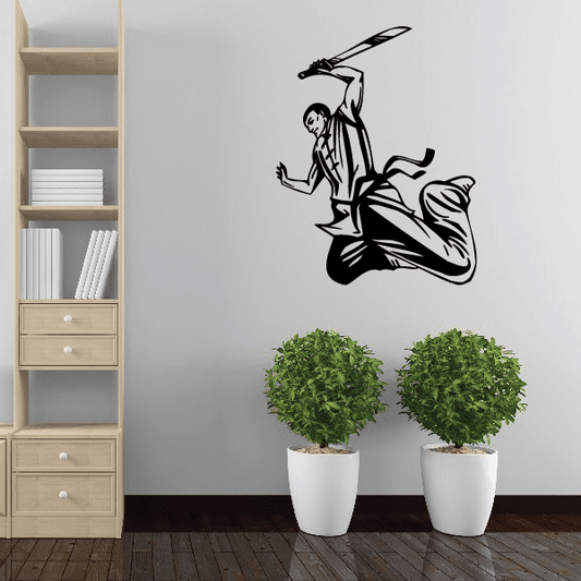 Karate wall decal vinyl sticker of a black kicking martial artist silhouette