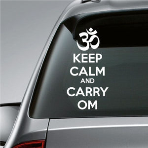 Yoga OM decal with KEEP CALM AND CARRY OM text on dark window